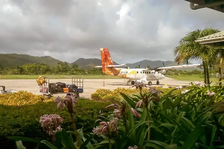 packing for family vacation - bags on the way to the airplane